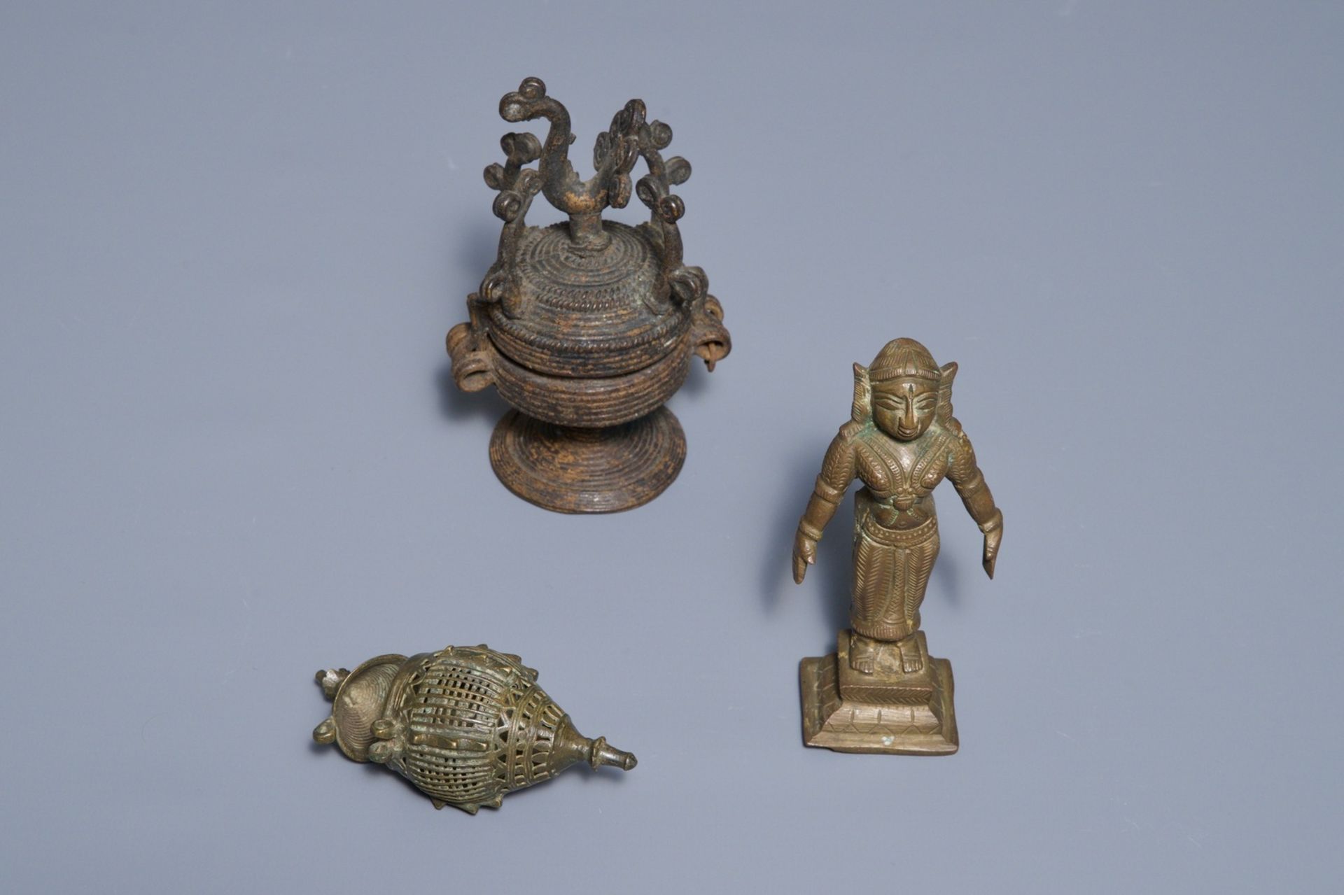 A group of silver and bronze statues and utensils, India, 18/19th C. - Image 4 of 4