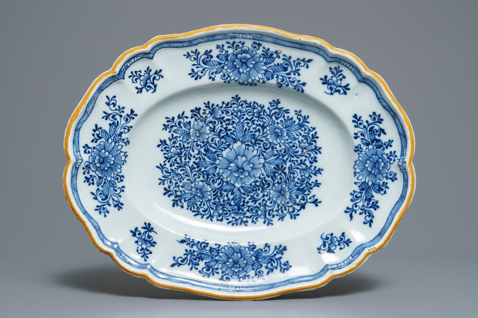 Two Dutch Delft blue and white chargers, an oval dish and a vase, 18th C. - Image 4 of 13