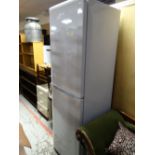 A Beko upright fridge freezer in white E/T