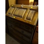 A vintage oak Old Charm four-drawer bureau