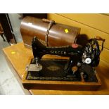 A vintage cased Singer sewing machine