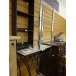 A metal framed & tile top narrow wine rack / table together with a chrome & glass shelved table,