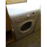 A Hotpoint Aquarius washing machine in white E/T