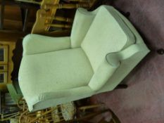 Classically shaped wingback armchair