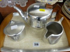 Three piece Picquot ware teaset on tray