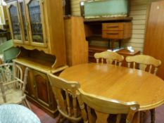 Modern country style extending table with four chairs and matching dresser with glazed leaded