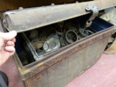Old metal trunk with another trunk inside containing good quantity of clock parts