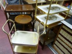 Two polished tea trollies, two brass effect tea trollies, a wine table and a towel airer