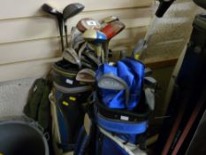 Two golf bags with quantity of clubs etc