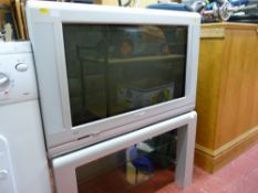 Phillips neat flatscreen TV on a stand E/T