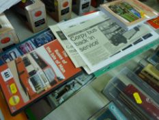 Selection of books, DVDs and other paraphernalia on buses including collector's guides