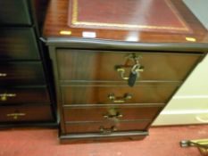Reproduction mahogany two drawer filing cabinet with gilt tooled leather top and key