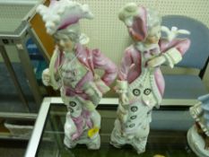 Pair of Continental porcelain figures of a musician and his lady