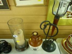 Two vintage style candleholders and a pottery whisky jug