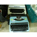 Vintage Brother portable typewriter and one other