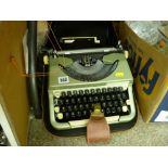 Cased vintage portable typewriter