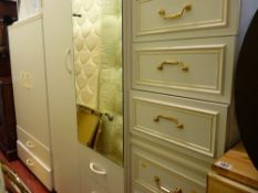 Suite of white melamine bedroom furniture including a mirrored wardrobe and tallboy, two four drawer