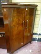 Art Deco figured mahogany two door corner cabinet