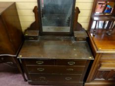 Circa 1900 mirrored dressing chest of two short over two long drawers