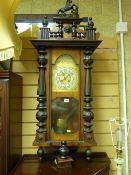 Victorian walnut cased Vienna style wall clock