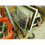 Three photographic prints and a selection of walking canes and umbrellas etc