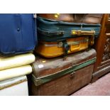 Vintage tin travel trunk and a quantity of modern luggage