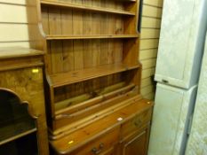 Reproduction pine dresser base and an associated wall rack