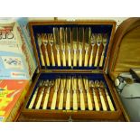 Good oak cased canteen of twelve bone handled fish knives and forks, all with silver ferrules