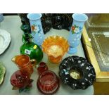 Parcel of carnival and cranberry glassware, a green decanter (damaged) and a pair of milk glass
