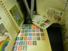 World stamps and first day covers - three albums plus a sleeved album of first day covers, 70's