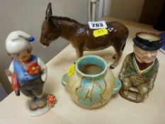 Beswick pottery donkey, small Royal Doulton Toby jug, small Crown Devon bowl and a Hummel type