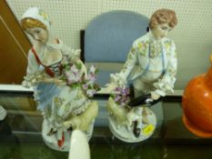 Dandy pair of European porcelain figurines of a young man and woman with sheep at their feet