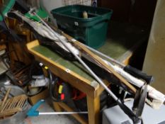 A cased set of vintage ski's & ski poles together with a vintage bow & fishing rod