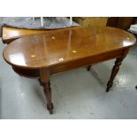 A vintage mahogany D-ended console table