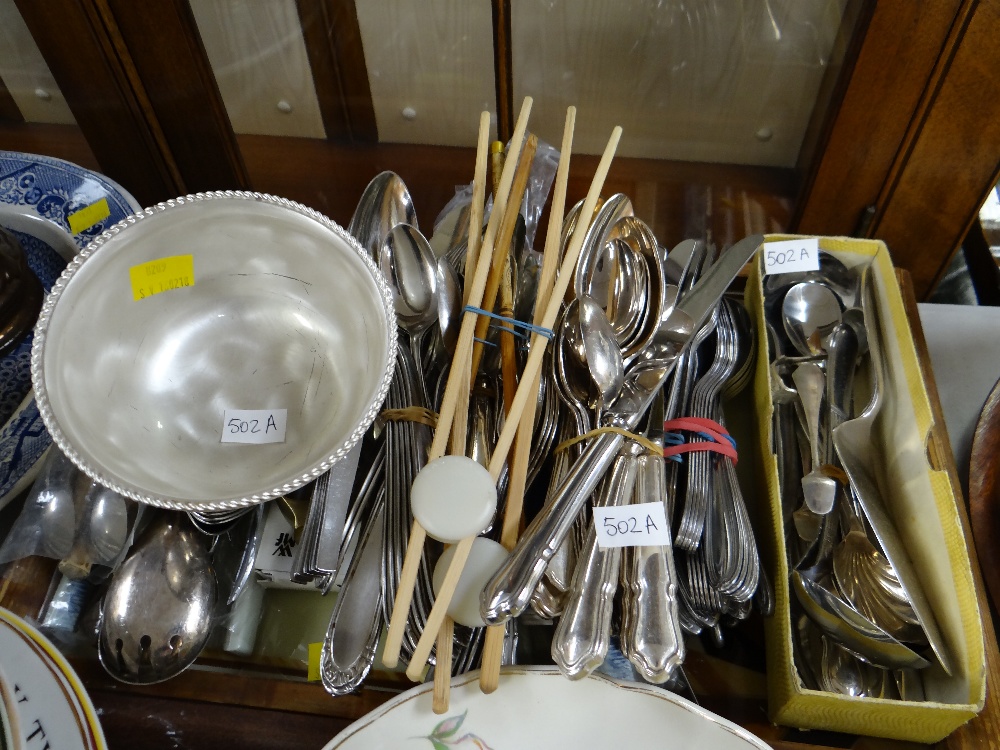A tray of loose flatware