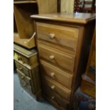 Tall narrow pine chest of five drawers