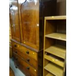 An antique mahogany press cupboard together with a shelving unit