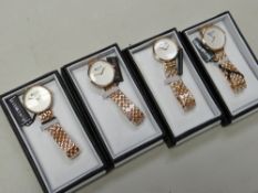 Four Barkers of Kensington 'Regatta' white faced ladies wristwatches