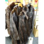 Three fur coats