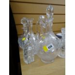 A Victorian etched glass decanter together with other cut glass decanters