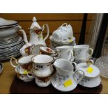 Royal Albert 'Old Country Roses' teaset together with a vintage West German decorated teaset