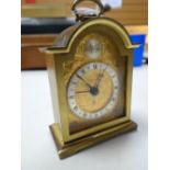 Swiza swiss brass & gilt faced small mantel clock