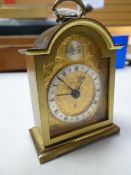 Swiza swiss brass & gilt faced small mantel clock