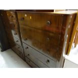 A pair of vintage mahogany six-drawer chests of drawers