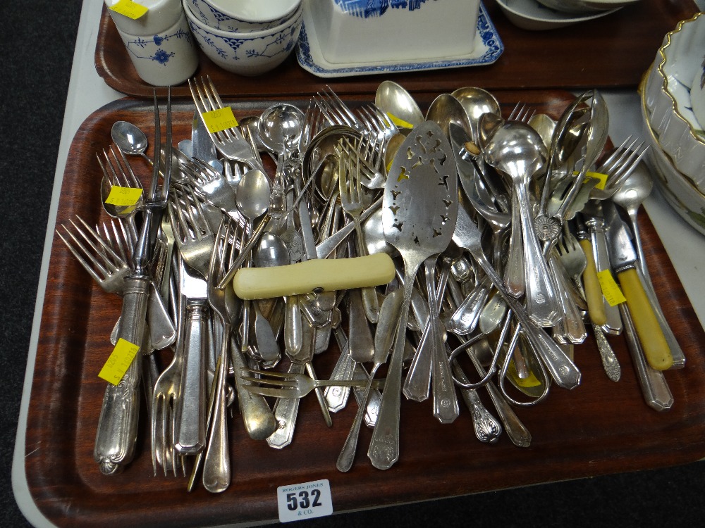 A tray of loose flatware