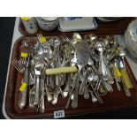 A tray of loose flatware