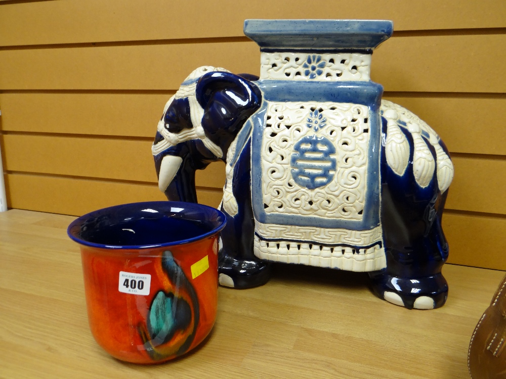 A Chinese ceramic elephant stool & a Poole pottery planter