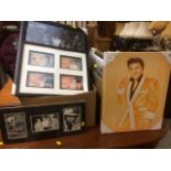 Box of various Elvis memorabilia including lap trays, photographs, prints etc together with a box of