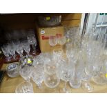 A large collection of mainly cut glass drinking glasses, vases, bowls & jugs etc