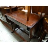 A reproduction mahogany drop-end sofa table